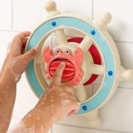 Jouet de bain rotatif avec ventouse - Itzy Capitaine | Itzy Ritzy